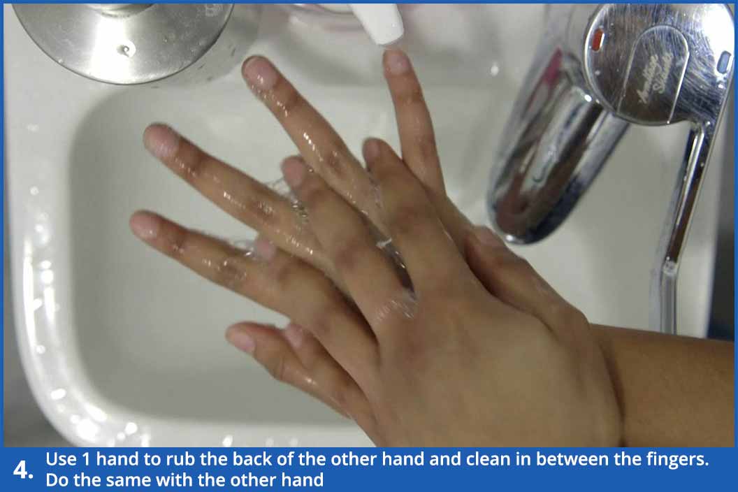 4a.hand washing rub back of hand.width 1534